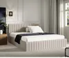 A bedroom scene with a bed as the main focus.