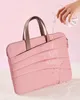 A hand is pouring water onto a pink laptop bag to demonstrate its water-resistant feature. Produktbild-Vorschau