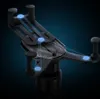 A close-up, stylized view of a black smartphone car mount with blue glowing dots and lines indicating points of connection or support. Produktbild-Vorschau