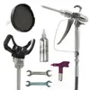 A collection of airless paint sprayer parts and accessories arranged on a white background. Produktbild-Vorschau