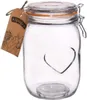 A clear glass jar with a heart design and a swing-top lid, with a decorative tag attached. Náhled obrázku produktu