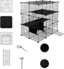 A multi-level wire cage for small animals, shown with various components and accessories. Podgląd zdjęcia produktu