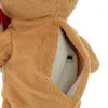 A close-up view of the back of a plush toy, showing an open compartment with electronic components inside. Voir les images du produit