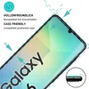 A close-up of a smartphone screen protector being applied to a Samsung Galaxy A06 phone. The protector is shown to be case-friendly. Produktbild-Vorschau