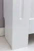 A close-up view of the corner of a white radiator cover. Podgląd zdjęcia produktu
