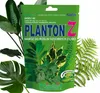A package of plant fertilizer with images of various green plants. Produktbild-Vorschau