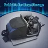 A camera bag with headphones inside, placed on top of a laptop. Náhled obrázku produktu