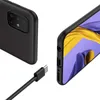 A black phone case and a USB-C cable are shown against a white background. Produktbild-Vorschau