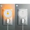 Two night lights plugged into wall sockets, one showing a warm amber light and the other off. Produktbild-Vorschau