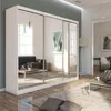 A modern living room with a large white wardrobe with mirrored doors. Produktbild-Vorschau