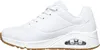 A side view of a white Skechers sneaker with a brown sole. Anteprima dell’immagine prodotto