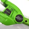A close-up view of a green electric hedge trimmer, showing the brand logo and an instructional diagram. Náhľad obrázku produktu