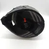 A black modular helmet with gray stripes on the inside lining, shown from a top-down perspective. Náhled obrázku produktu