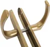 A close-up view of two gold-colored door handles connected by a metal rod. Anteprima dell’immagine prodotto