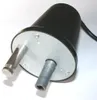 A close-up view of a grill motor with two prongs extending from the bottom. Náhled obrázku produktu