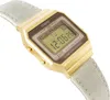 A close-up, angled shot of a gold-colored digital watch with a gray fabric strap, displayed against a white background. Voir les images du produit