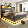 A bedroom scene featuring a modern LED upholstered bed with integrated storage and USB charging. Produktbild-Vorschau