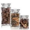 Three glass jars filled with different food items, arranged on a white background. Produktbild-Vorschau