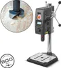 A collage showing a drill bit in wood and a drill press. Produktbild-Vorschau