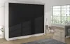 A modern wardrobe with black sliding doors in a room with large windows. Náhled obrázku produktu
