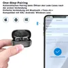 A hand holding a pair of wireless earbuds in their charging case, with a smartphone screen showing a successful Bluetooth connection. Produktbild-Vorschau