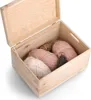 An open wooden box filled with balls of yarn. Náhled obrázku produktu