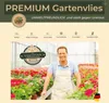A man in an apron stands in a greenhouse surrounded by potted plants, with a marketing banner above. Produktbild-Vorschau