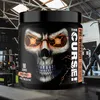 A tub of JNX Sports The Curse! pre-workout powder with a skull design, placed in a gym setting. Produktbild-Vorschau