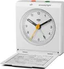 A white Braun alarm clock is shown open, with its face and a folded-down informational flap visible. Voir les images du produit