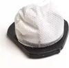 A white fabric filter sits on a black plastic base, isolated on a white background. Produktbild-Vorschau