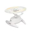 A white baby swing chair with a beige seat and a yellow light ring around the top. Anteprima dell’immagine prodotto