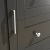 A close-up view of a dark gray cabinet with a silver handle and drawer knobs. Podgląd zdjęcia produktu