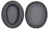 Two black ear pads for headphones are shown against a white background. Produktbild-Vorschau