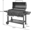 A charcoal grill with dimensions indicated by measurement lines and text. Produktbild-Vorschau