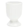 A white ceramic egg cup with vertical ridges and a pedestal base, isolated on a white background. Podgląd zdjęcia produktu