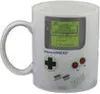 A white mug with a design resembling a Nintendo Game Boy. Produktbild-Vorschau