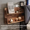 A close-up of a wooden shelf with decorative items and a book, attached to a bed frame. Náhľad obrázku produktu