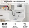 A close-up view of a white vanity or desk with a hairdryer plugged into a built-in power strip, and a phone charging. Voir les images du produit