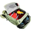 An open duffel bag with various items packed inside, including boots, a water bottle, and flip-flops. Anteprima dell’immagine prodotto