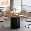 A modern office conference room with a round wooden table and chairs. Anteprima dell’immagine prodotto