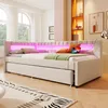 A modern daybed with LED lighting in a bedroom setting. Produktbild-Vorschau
