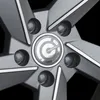 A close-up view of a car wheel's center cap and lug nut holes. Anteprima dell’immagine prodotto