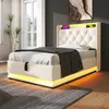 A modern white upholstered bed with LED lighting is shown in a bedroom setting. Náhľad obrázku produktu