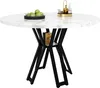 A round dining table with a marble-patterned top and black legs, set against a white background. There are some decorative items on the table. Produktbild-Vorschau