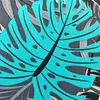 A close-up of a turquoise leaf pattern on a fabric. Produktbild-Vorschau