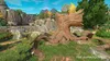 A video game environment with a large tree stump in the foreground and rocky terrain in the background. Produktbild-Vorschau