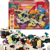 The image shows the packaging of a Gravitrax Junior Starter-Set with a dinosaur theme, along with a separate image of the assembled toy set. Anteprima dell’immagine prodotto