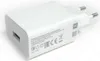 A white power adapter with a USB port and European-style prongs. Náhľad obrázku produktu