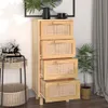 A wooden sideboard with four drawers, each featuring a rattan front, is shown in a room setting. Anteprima dell’immagine prodotto