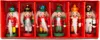 A set of six wooden nutcracker ornaments in a red box. Voir les images du produit